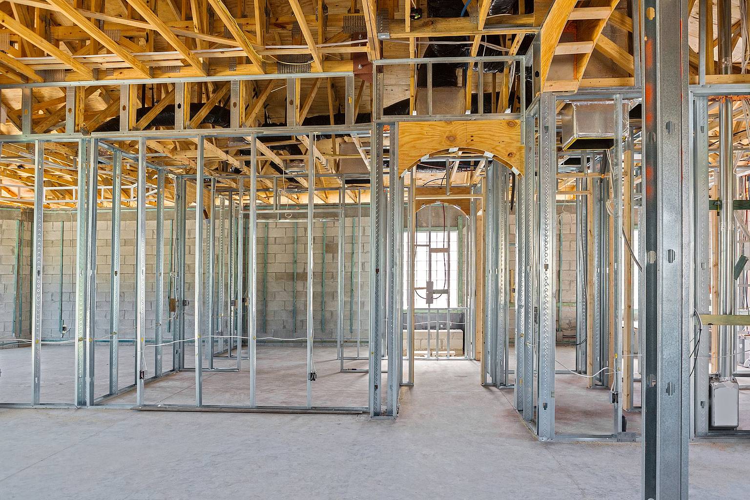 A room containing steel framing.