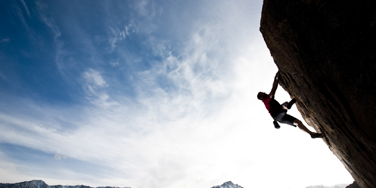 man rock climbing