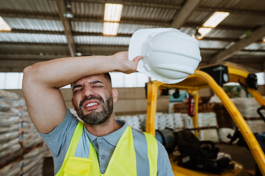 Exhausted warehouse worker