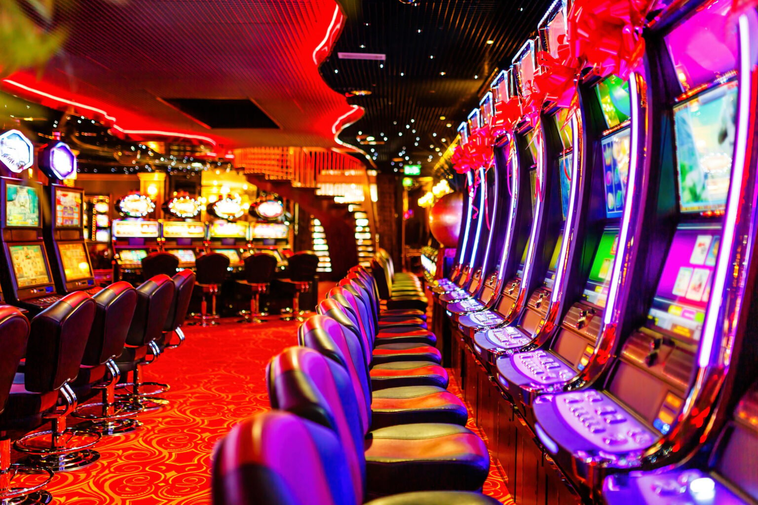 A row of slot machines in a casino.